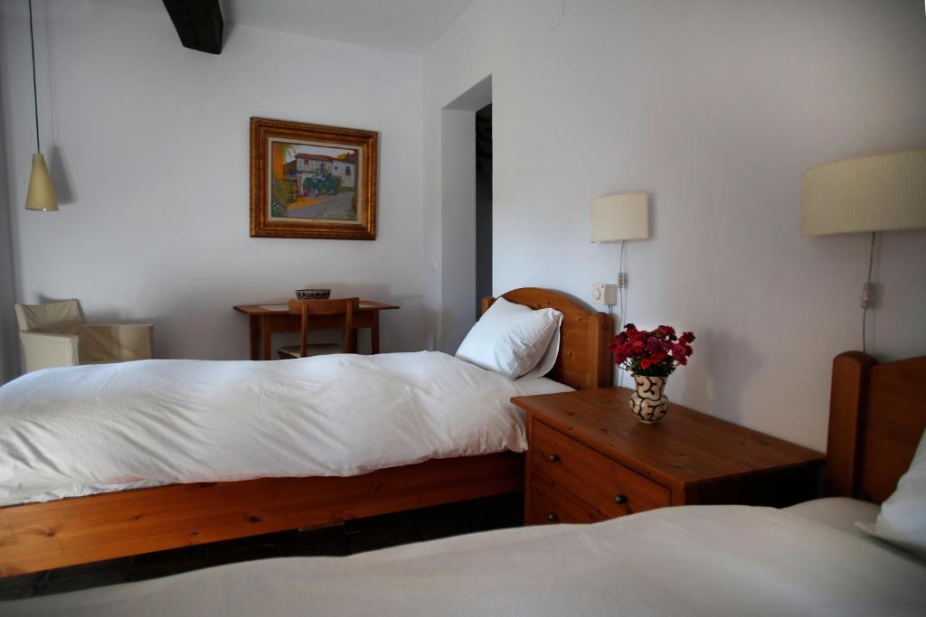 Posteľ alebo postele v izbe v ubytovaní Casa Rural Hosteria Cantarranas
