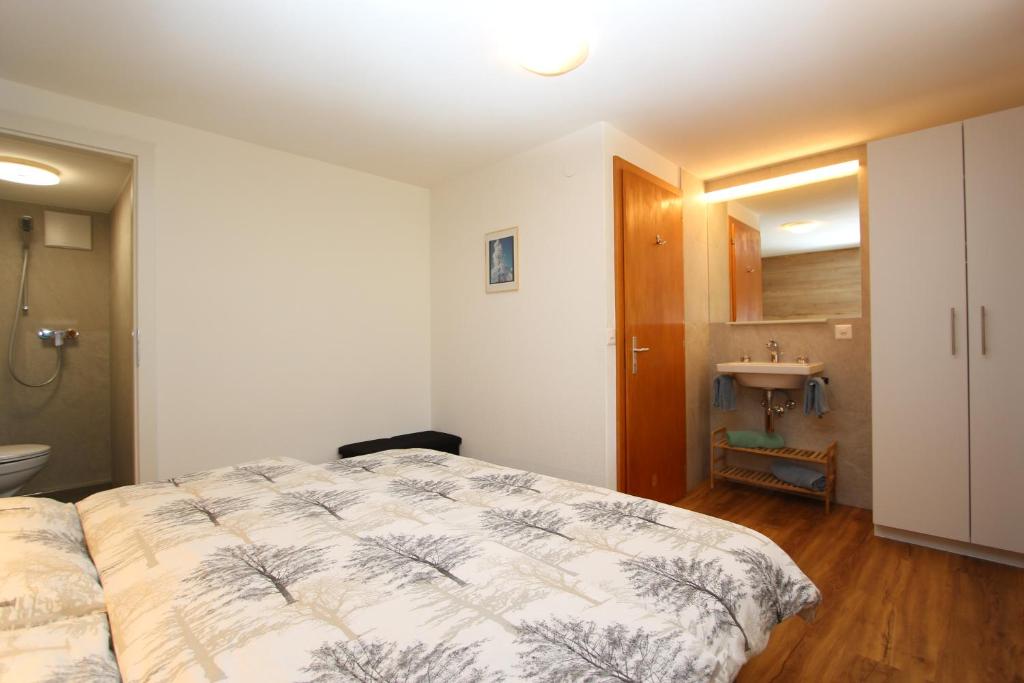 Postel nebo postele na pokoji v ubytování Haus Primavera