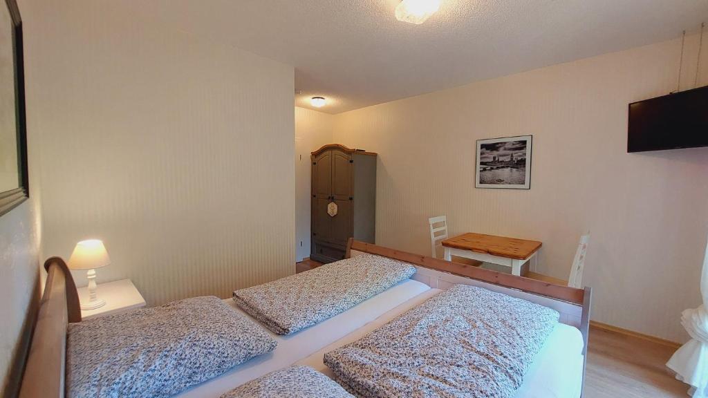 Postel nebo postele na pokoji v ubytování Gästehaus Gerhardt