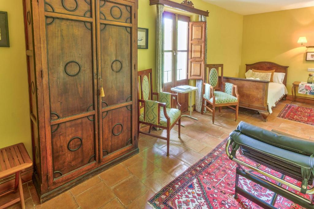 Posteľ alebo postele v izbe v ubytovaní Cortijo El Pino Retreat