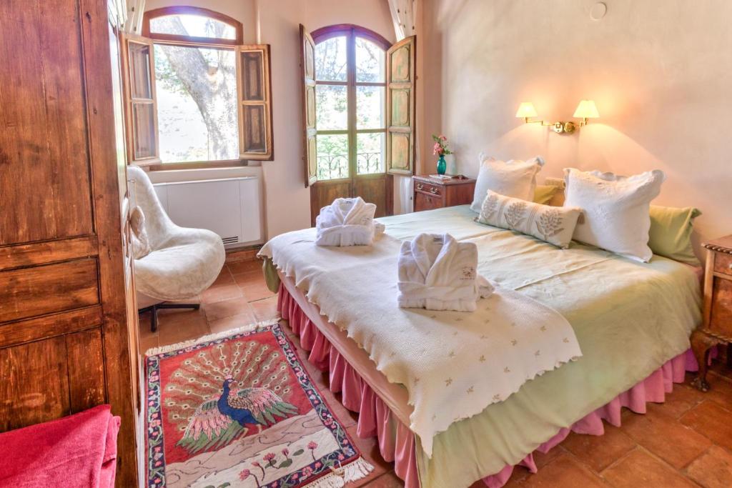 Posteľ alebo postele v izbe v ubytovaní Cortijo El Pino Retreat