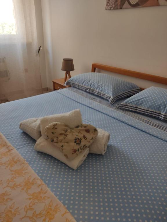 Postel nebo postele na pokoji v ubytování Corte Lavito