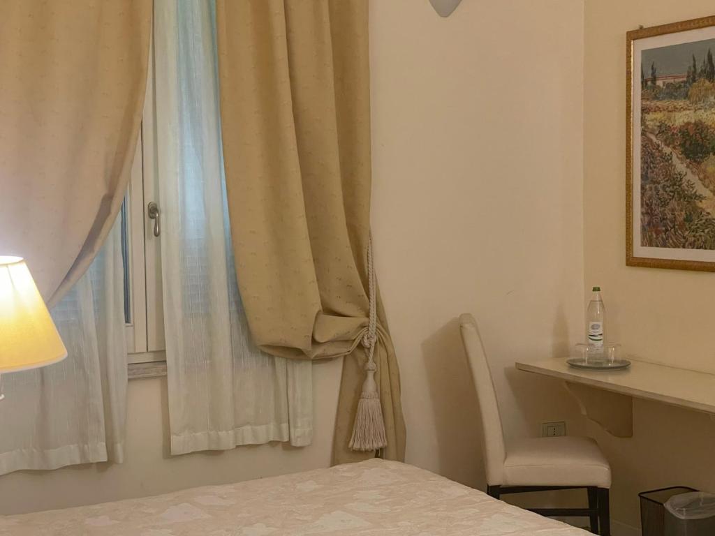 Postel nebo postele na pokoji v ubytování Casa Piermarini