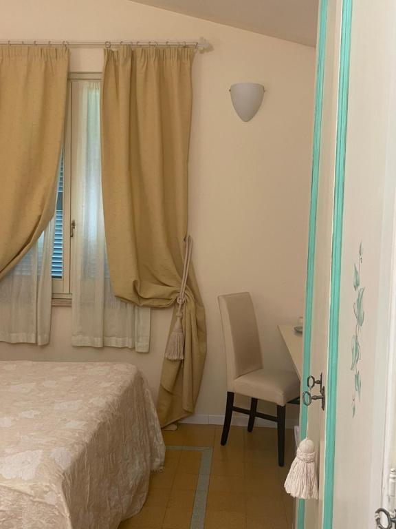Postel nebo postele na pokoji v ubytování Casa Piermarini