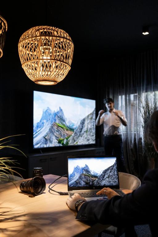 TV a/nebo společenská místnost v ubytování Smart Hotel Saslong