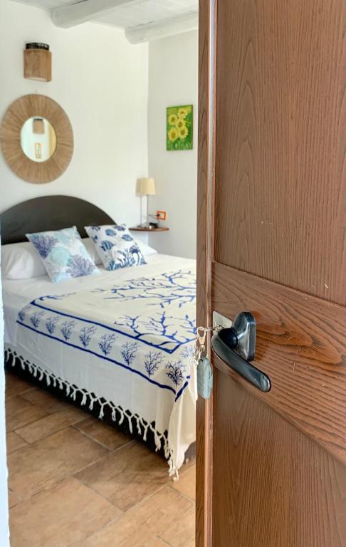 A bed or beds in a room at Il Calesse - Noto