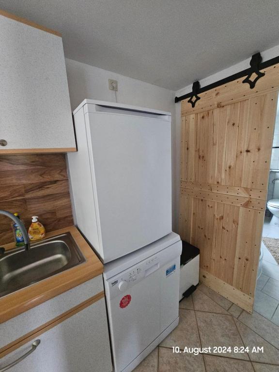 Kuchyň nebo kuchyňský kout v ubytování Bungalow ,, Zur langen Heide,,