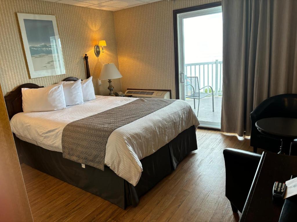 Postel nebo postele na pokoji v ubytování Motel vue Belvédère