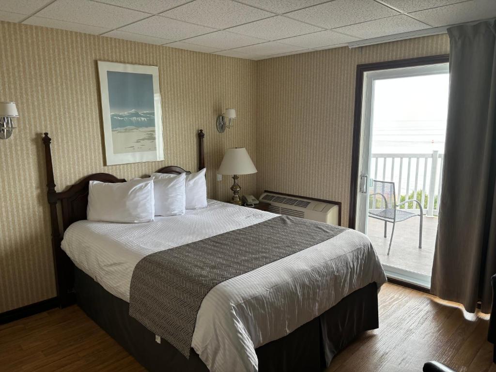 Postel nebo postele na pokoji v ubytování Motel vue Belvédère