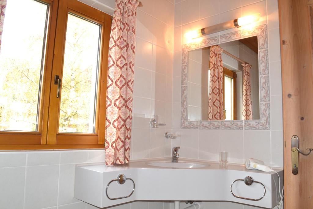 Koupelna v ubytování Hotel Aurach