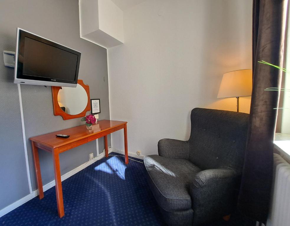 TV a/nebo společenská místnost v ubytování Hotell Drott