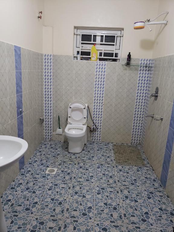Koupelna v ubytování Gloria House