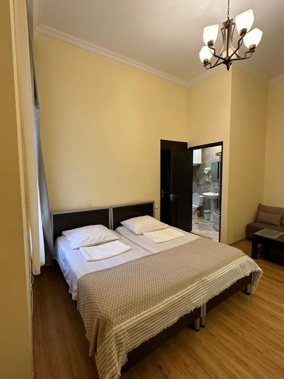 Postel nebo postele na pokoji v ubytování Golden Lion