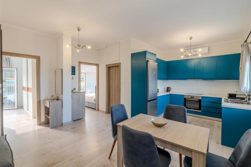 Η κουζίνα ή μικρή κουζίνα στο Nikos Lemon Garden Apartment