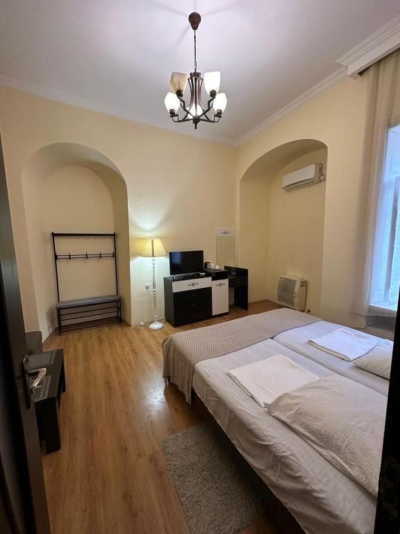 Postel nebo postele na pokoji v ubytování Golden Lion