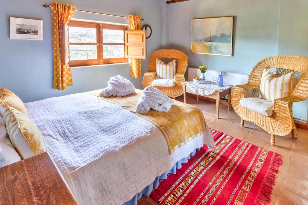 Posteľ alebo postele v izbe v ubytovaní Cortijo El Pino Retreat