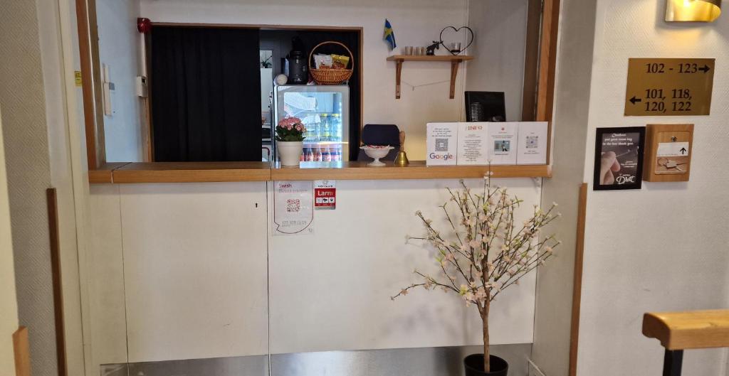 Kuchyň nebo kuchyňský kout v ubytování Hotell Drott