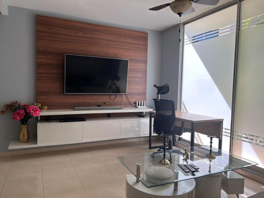 TV in/ali zabaviščno središče v nastanitvi Apartamento en Valledupar