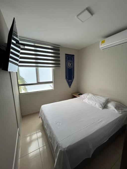 Postelja oz. postelje v sobi nastanitve Apartamento en Valledupar