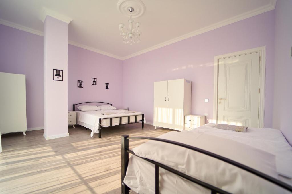 Postel nebo postele na pokoji v ubytování Premium Sea View Hotel & Hostel