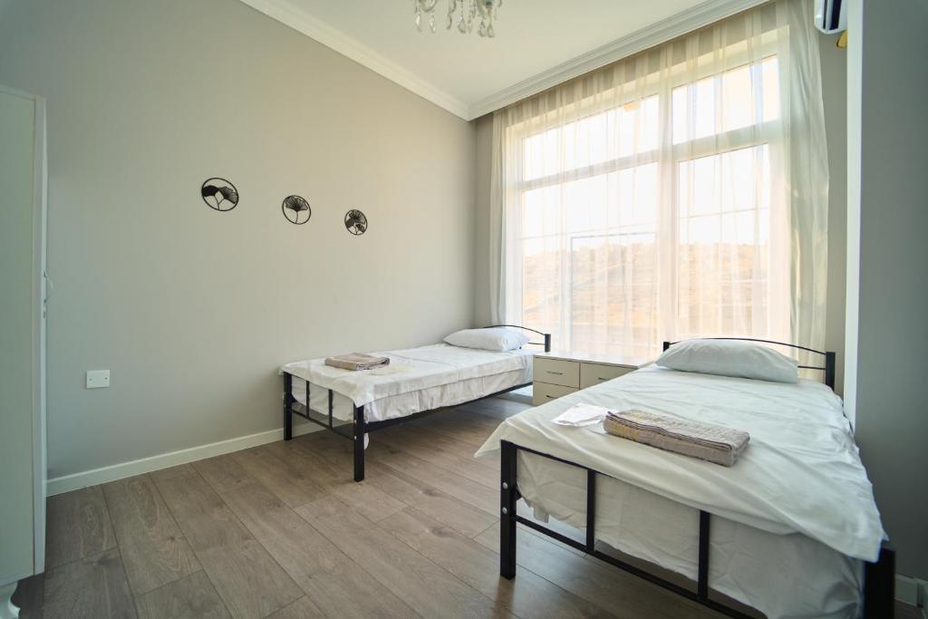 Postel nebo postele na pokoji v ubytování Premium Sea View Hotel & Hostel