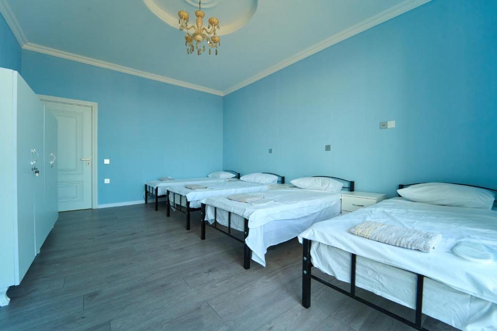 Postel nebo postele na pokoji v ubytování Premium Sea View Hotel & Hostel