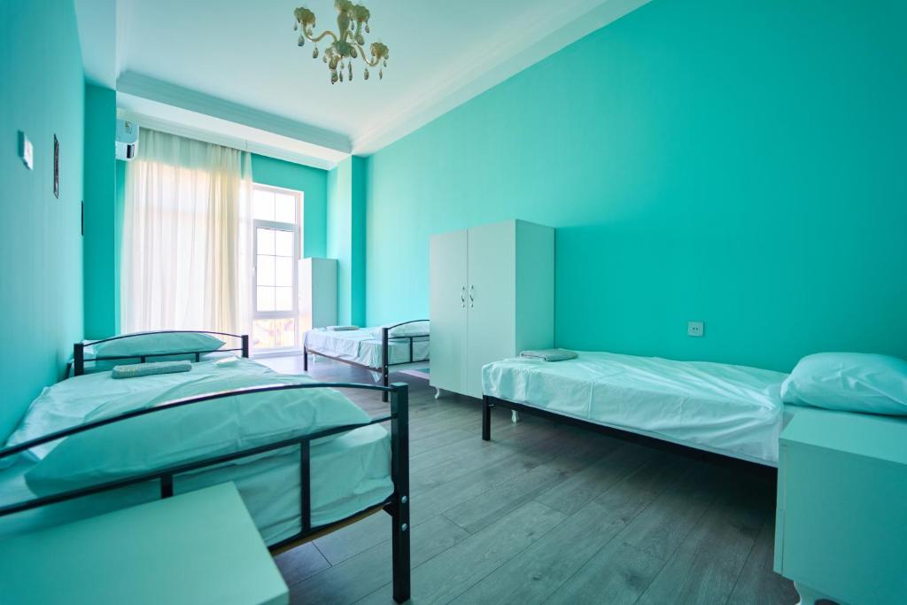 Postel nebo postele na pokoji v ubytování Premium Sea View Hotel & Hostel