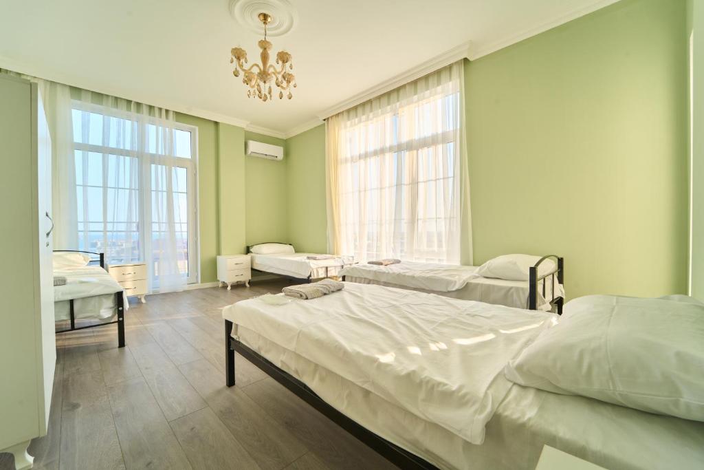 Postel nebo postele na pokoji v ubytování Premium Sea View Hotel & Hostel