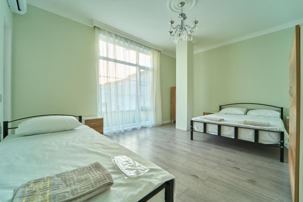 Postel nebo postele na pokoji v ubytování Premium Sea View Hotel & Hostel
