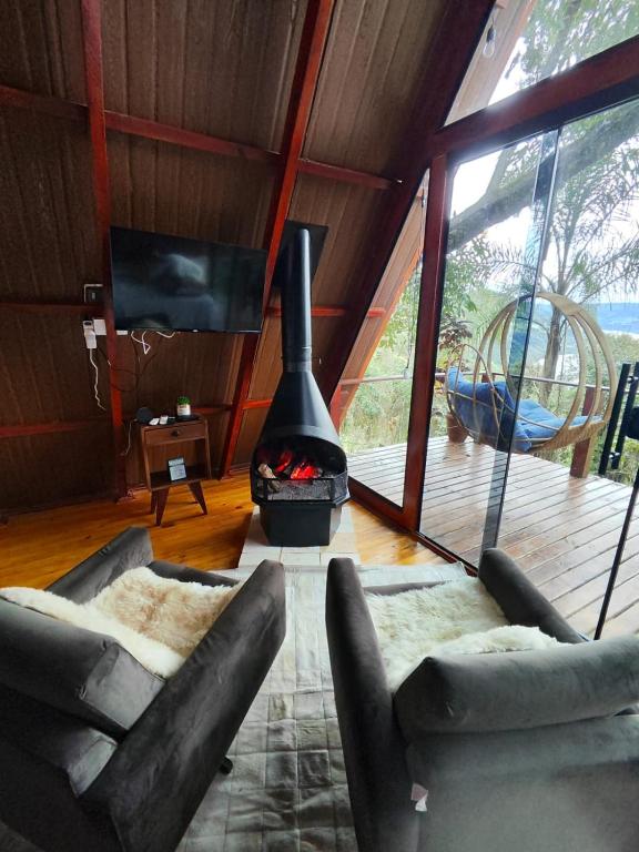 Posezení v ubytování Mirante Cabanas da Serra
