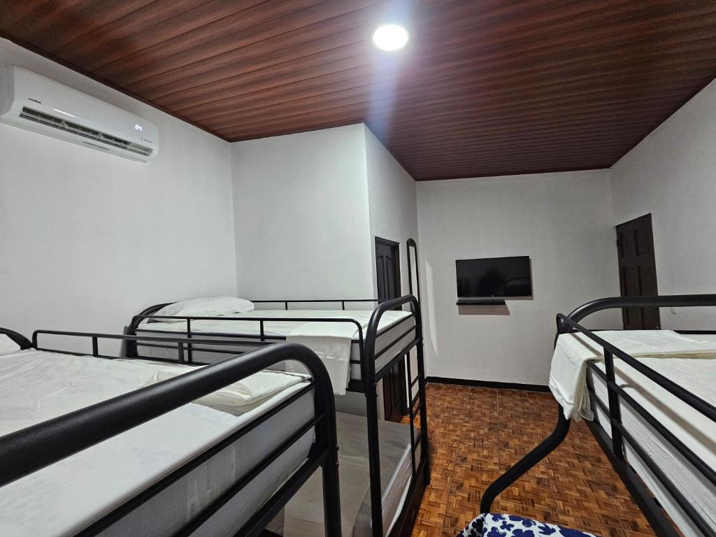 Postel nebo postele na pokoji v ubytování Hotel Luna Liberiana