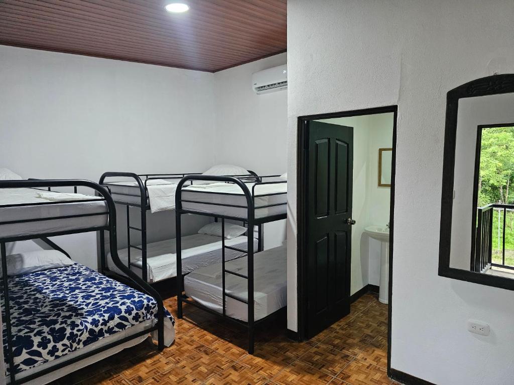 Postel nebo postele na pokoji v ubytování Hotel Luna Liberiana