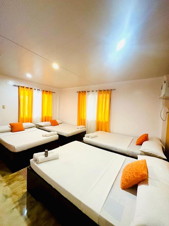 Postel nebo postele na pokoji v ubytování Vicente Aguirre Rooms