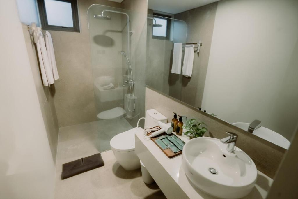 Koupelna v ubytování Jiro Hotel