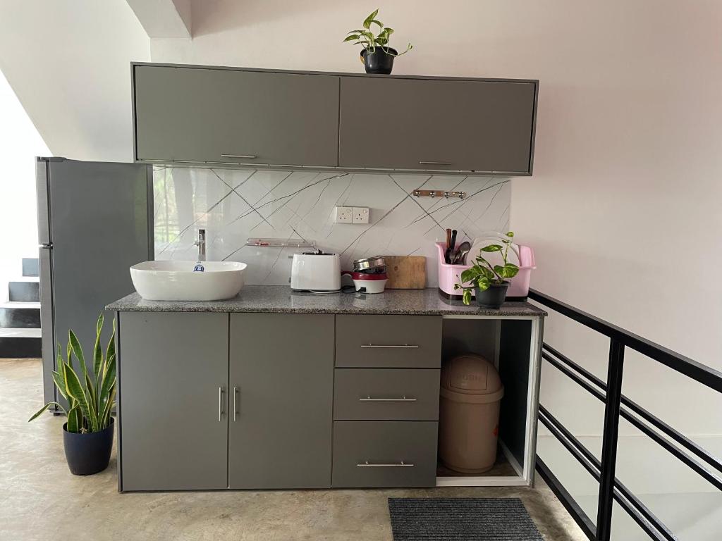 Kuchyň nebo kuchyňský kout v ubytování Abinu"s Place