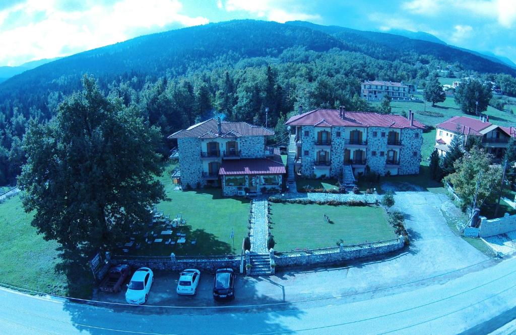 an aerial view of a large house with a yard at Hotel Orama in Kryonérion