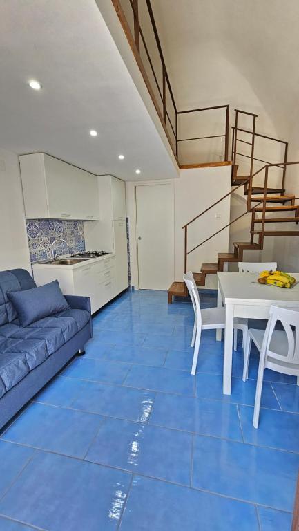 Khu vực ghế ngồi tại A Quattro Passi dal Mare Ischia