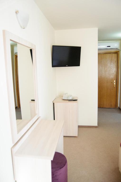 TV a/nebo společenská místnost v ubytování Hotel Doina