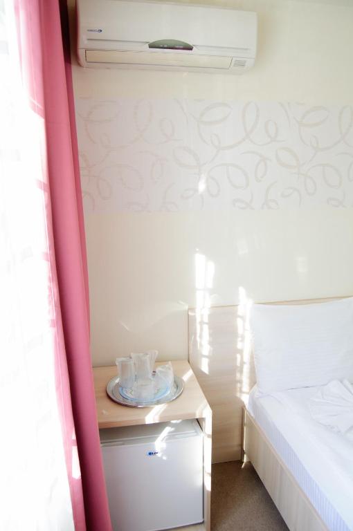 Postel nebo postele na pokoji v ubytování Hotel Doina