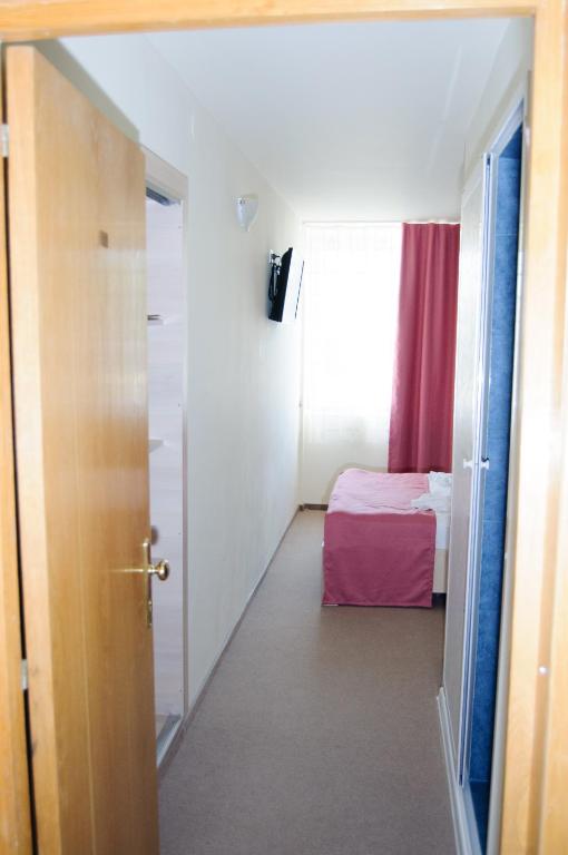 Postel nebo postele na pokoji v ubytování Hotel Doina