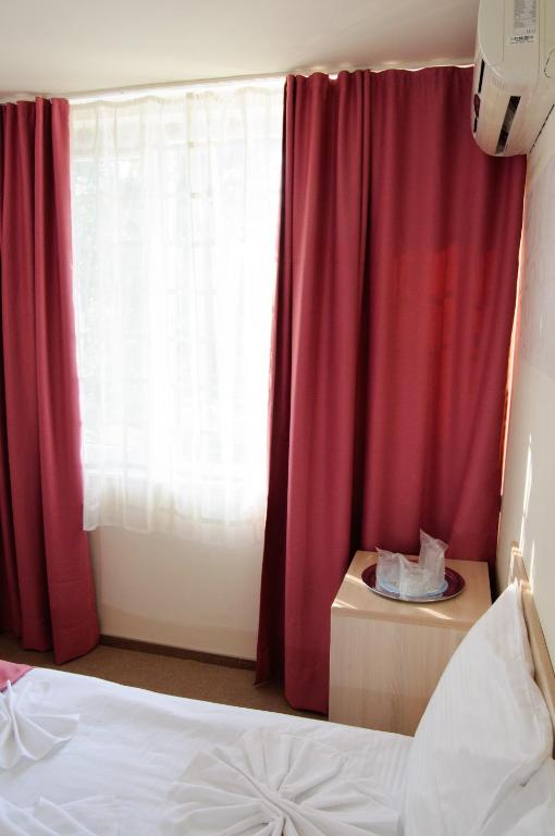 Postel nebo postele na pokoji v ubytování Hotel Doina