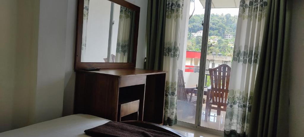 Postel nebo postele na pokoji v ubytování Empire Valley Hotel