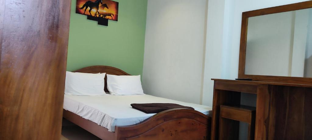 Postel nebo postele na pokoji v ubytování Empire Valley Hotel