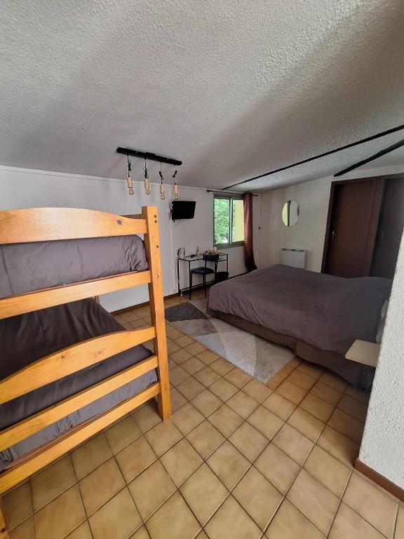 Postel nebo postele na pokoji v ubytování Hotel Le Connetable