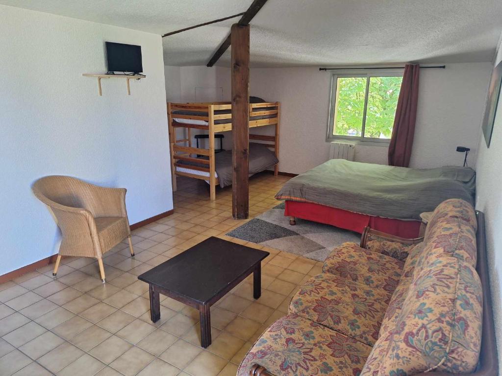 Postel nebo postele na pokoji v ubytování Hotel Le Connetable