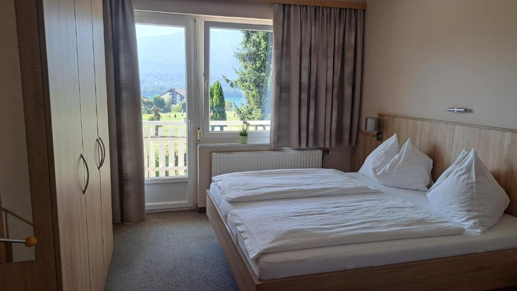 Postel nebo postele na pokoji v ubytování Haus Panorama