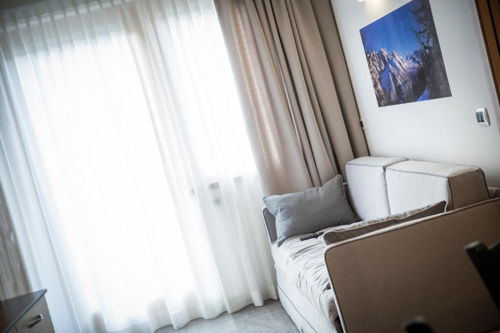 Posezení v ubytování Aparthotel Dolomites Living&Relax