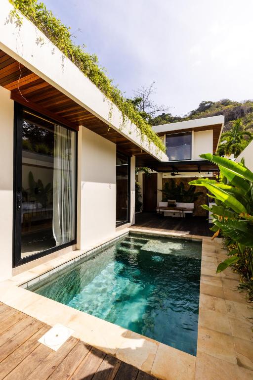 Bazén v ubytování Meraki Lombok Villas nebo v jeho okolí