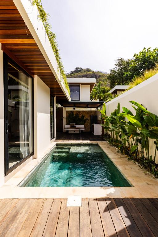 Bazén v ubytování Meraki Lombok Villas nebo v jeho okolí