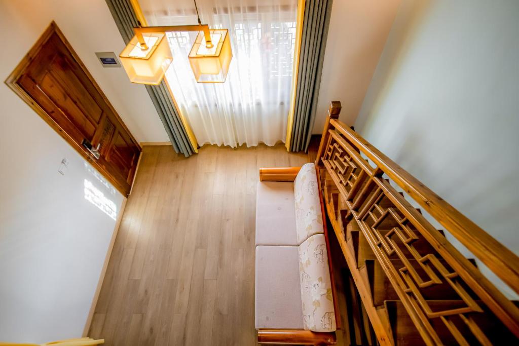 Postel nebo postele na pokoji v ubytování 宏村心自在客栈